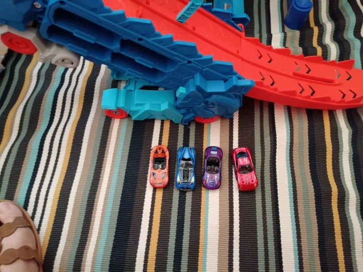 2-in-1 STEM Dinosaur Transport Truck with 2 Metal Cars, Safe for Ages 4+