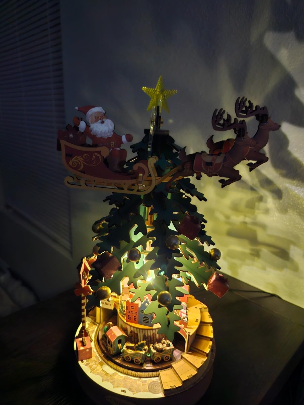 3D Wooden Christmas Tree Music Box with Featuring an Enchanting Holiday Scene, LED Lights, Moving Train, Safe for Ages 14+