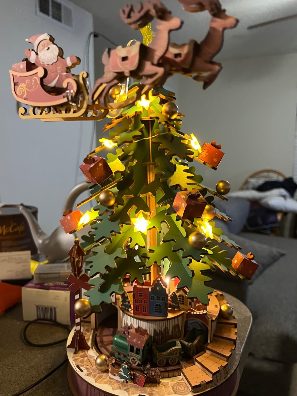 3D Wooden Christmas Tree Music Box with Featuring an Enchanting Holiday Scene, LED Lights, Moving Train, Safe for Ages 14+